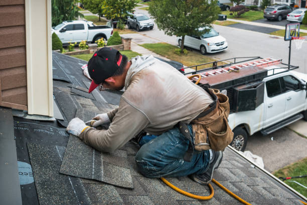 Professional Roof Replacement technician working in Trinway, OH